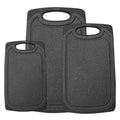 Set of three dark speckled chopping boards in different sizes