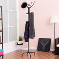 Black metal coat rack with 12 hooks in an entryway